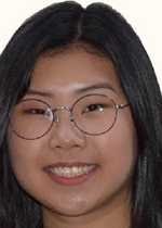 Headshot of Lauren Lim smiling at camera in front of white backdrop