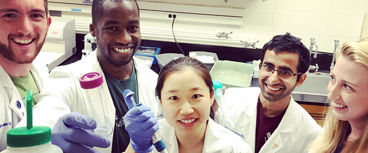 Five MSTP students in lab