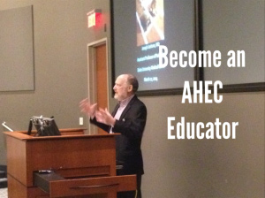 Become an AHEC Educator: person standing at lectern speaking