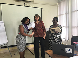 woman presented with award