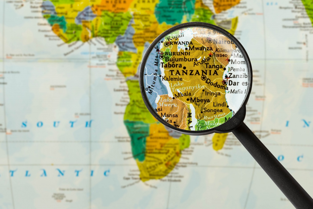 magnifying glass over map of tanzania