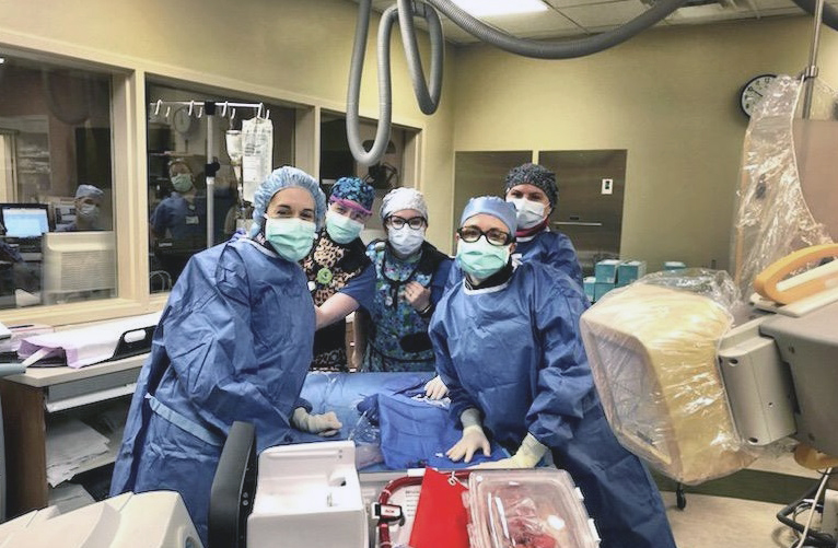 An all-female cath lab team, led by Jennifer Rymer, MD, in the OR.