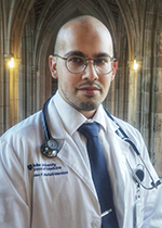 Portrait of student Aden Pepe Haskell-Mendoza in White Coat