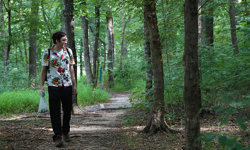 Jeff Letourneau walking in the woods