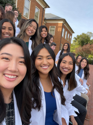 Group of students outside after white coat ceremony