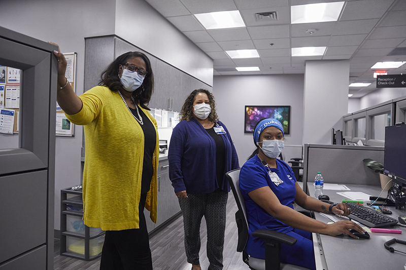 three women in a clinic