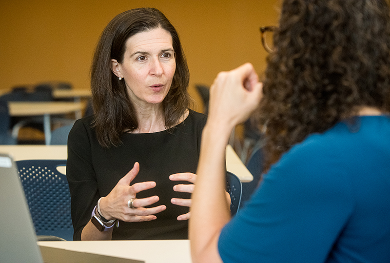 woman talking to another person