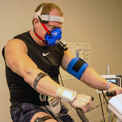 man on exercise health test bike