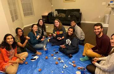 Interfaith students playing board games