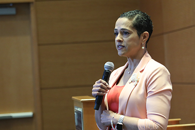 Coral May speaking at the Juneteenth Celebration