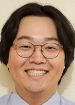 Headshot of David Chung wearing glasses and collared shirt