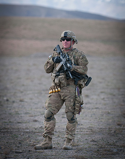 Adam Holbrook on deployment in military fatigues