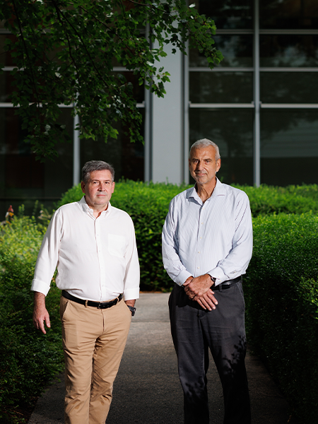 Jose Ramon Conejo-Garcia, Phd, and Scott Antonia MD in a courtyard, outsidetheir labs un