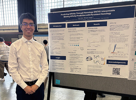 Yuxi (Jaden) Long presenting a Poster on the PATH