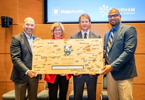 Image of Duke Health and Durham Tech Leadership with DECHS Principal, Mr. Brown