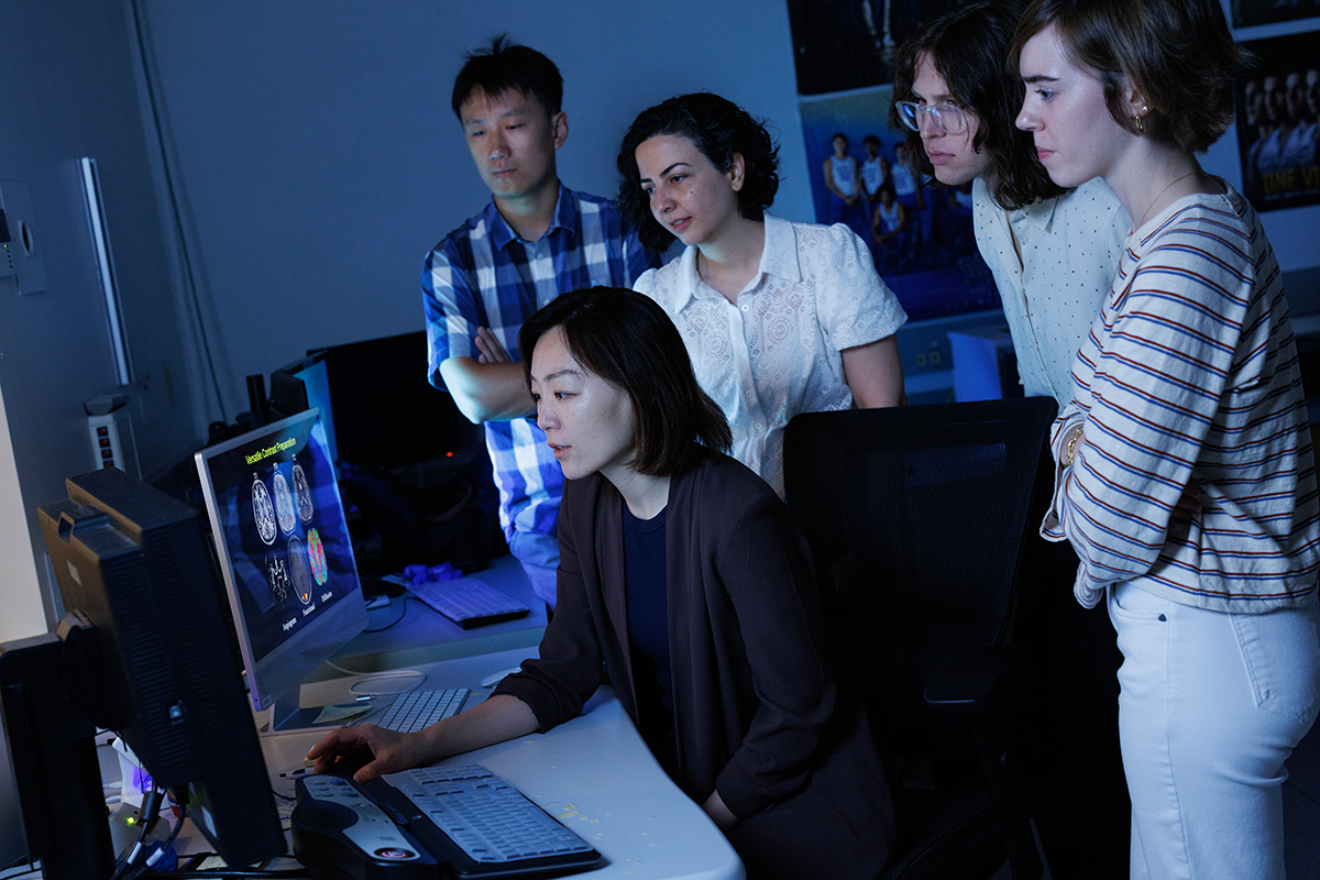 Dan Ma, PhD, with her lab members