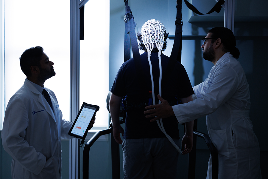 Lab members demonstrating Transcranial Direct Current Stimulation