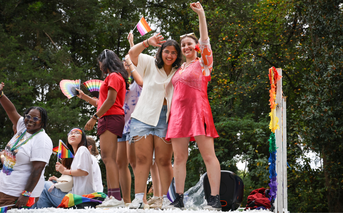 People on a Pride float.