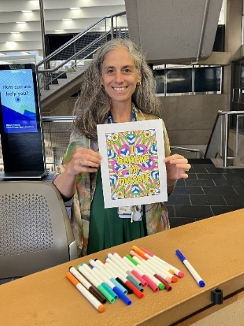 Dr. Gagliradi with the Art that she colored