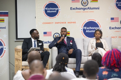 Ben Ncube (center) at the Zimbabwe Exchange Alumni Summit in 2023. 