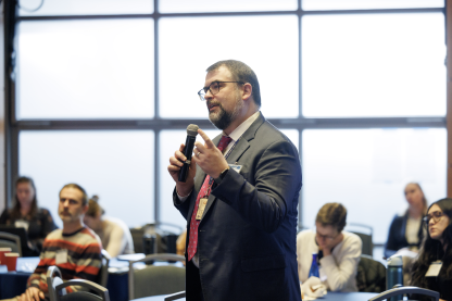 Robert Tighe, MD, director of the Climate and Health Research Initiative, gives attendees an overview of the initiative’s purpose.  