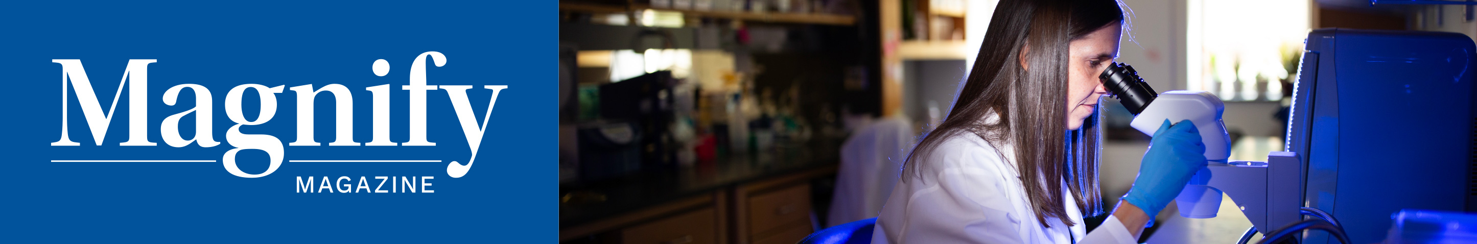 Magnify Logo beside a research looking into a microscope. 