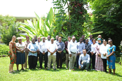 Catherine Staton, MD, Dr. Blandina Mmbaga (standing next to her) and the rest of the team.