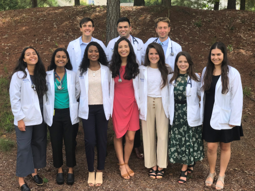 Skye Tracey, center bottom row, with her MSTP classmates.