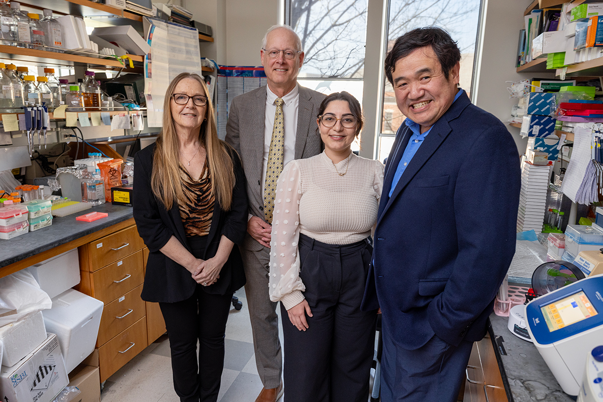 Jen-Tsan Ashley Chi, PhD, and researchers in the lab