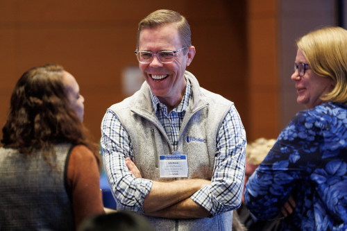 John Rawls, PhD, with symposium attendees. 