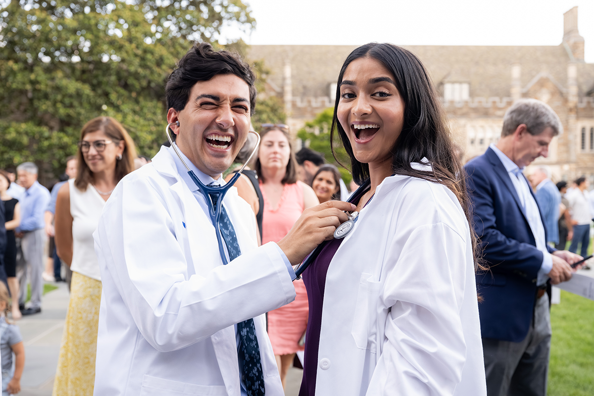 Students enjoying their new stethoscopes