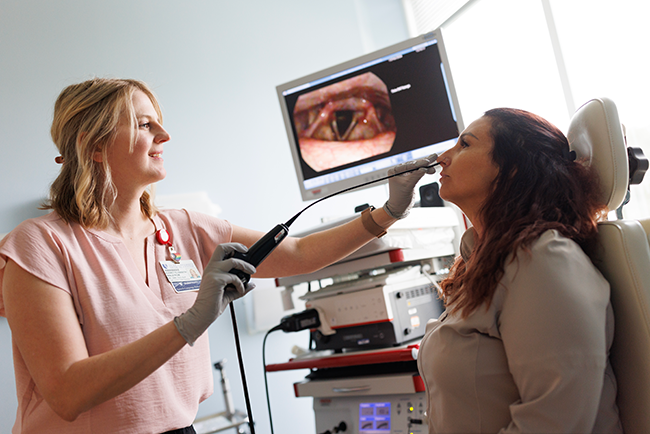 Walstrom works with a patient 
