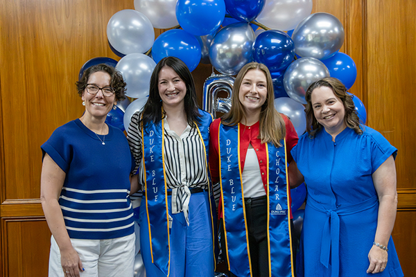 Stouder, Walden, Gubbels, and Hallquist posing for a photo
