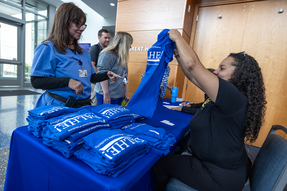 Participants getting their DALHE! T-shirts
