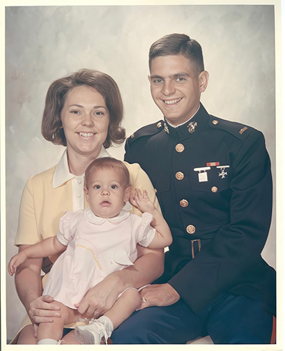 Photo of Jim Hill and wife and child