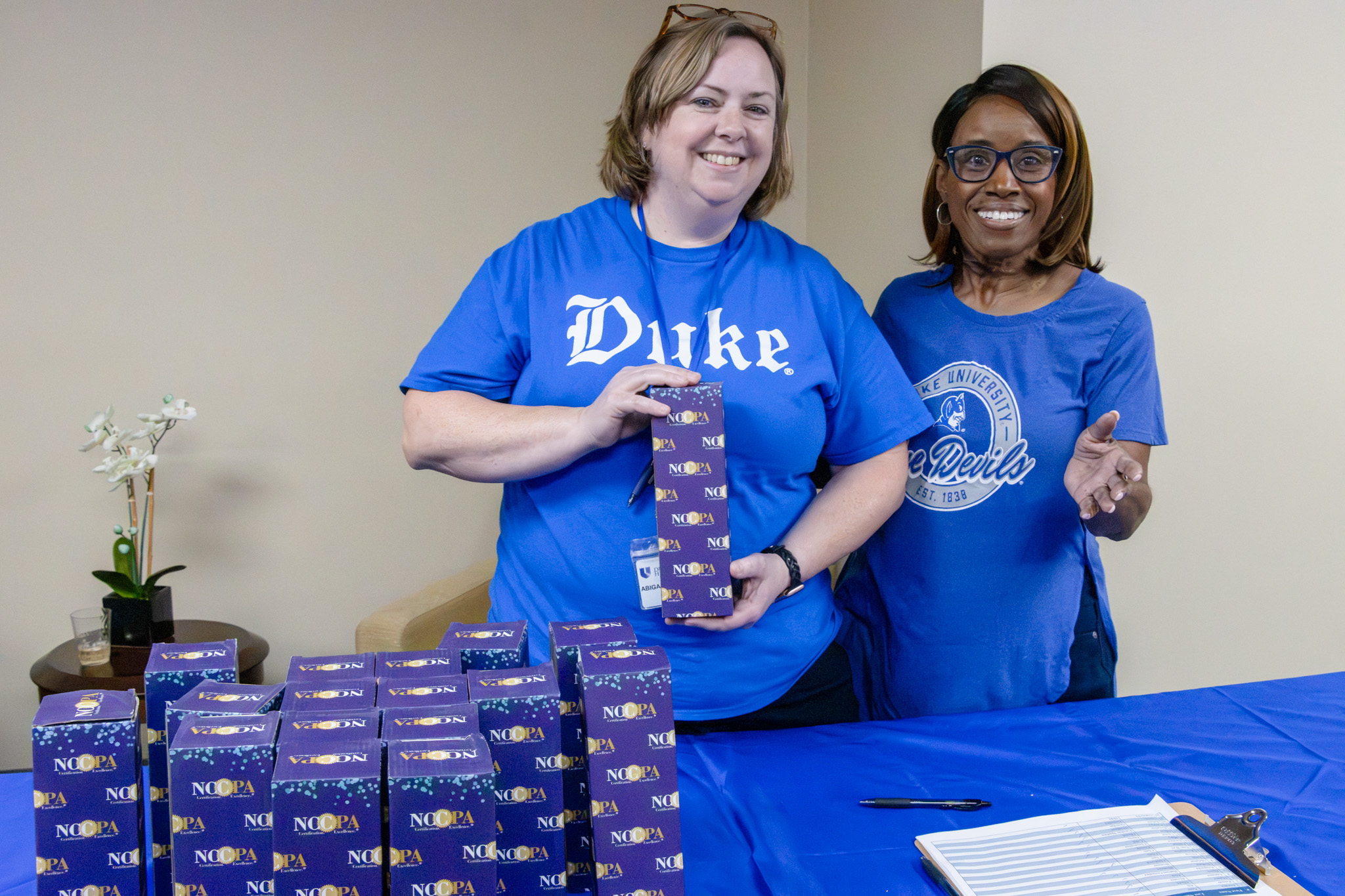 Duke PA Staff holding box.