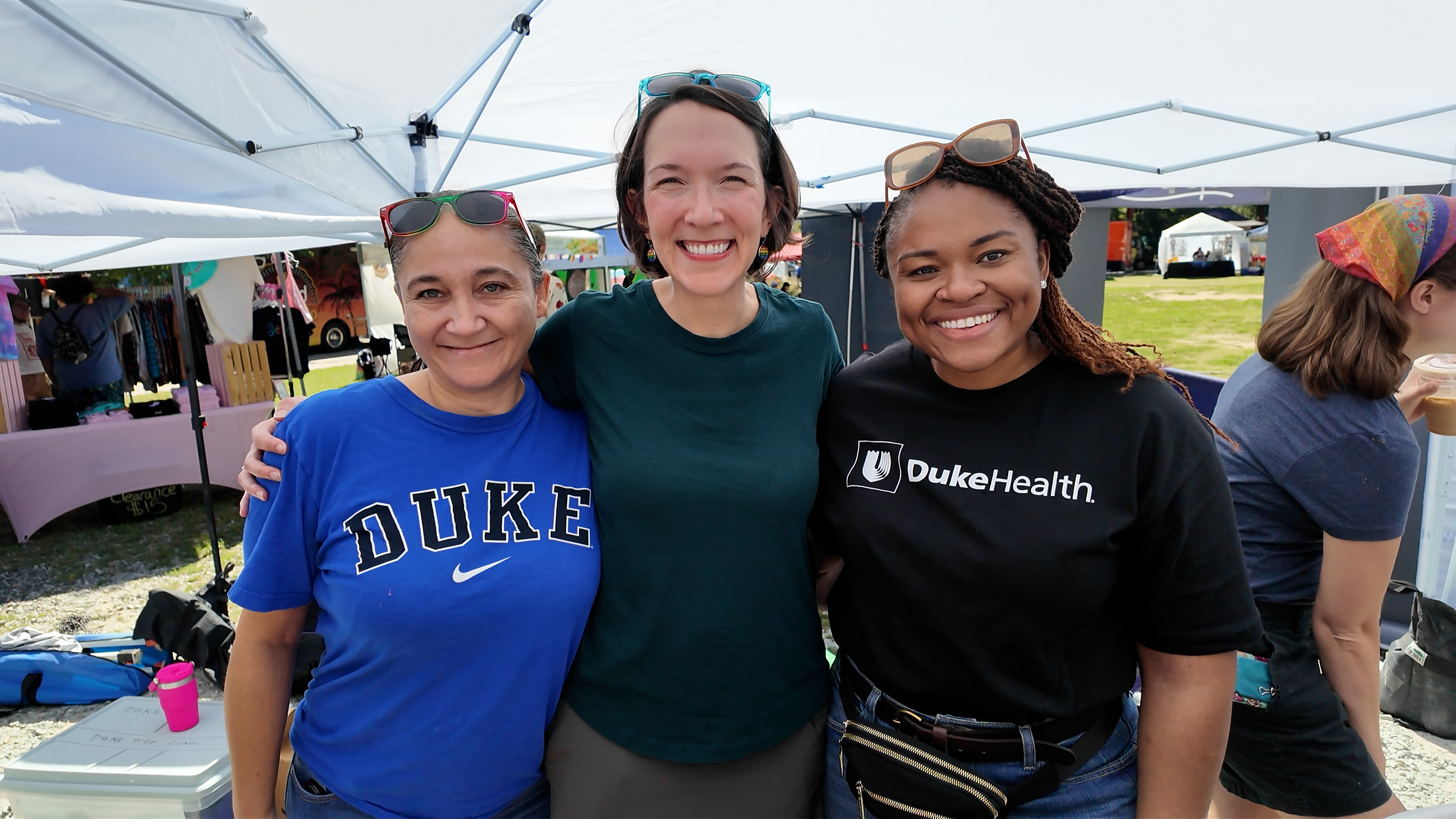 Group of three women representing Duke Dermatology at Durham Pride
