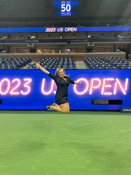 Laura Yeager jumping on the Tennis Courts at the 2023 US Open