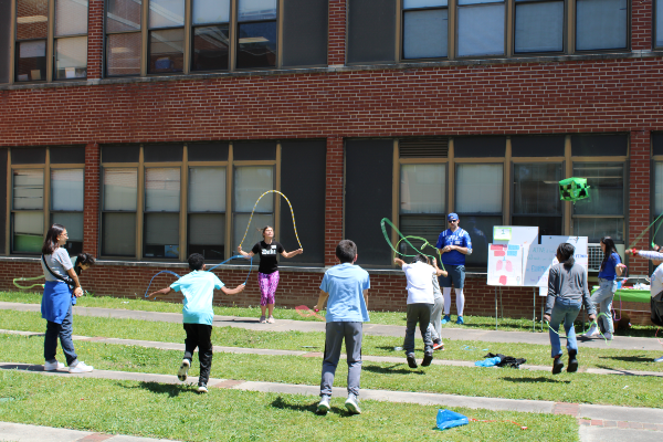 Duke PA Program students jumping rope with Burton Elementary students