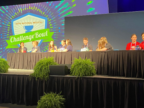 Duke students on stage at challenge bowl