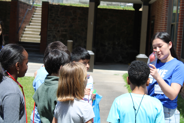 Duke students presenting to Burton Elementary students