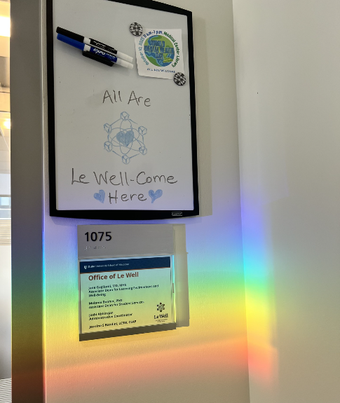 image of sign in front of door