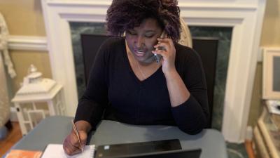 woman on the phone in her home