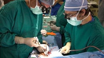 Surgeons performing a surgery