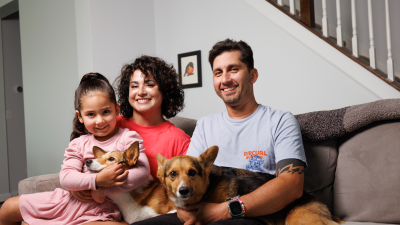 Iris Bugbee, her husband, daughter and dog.