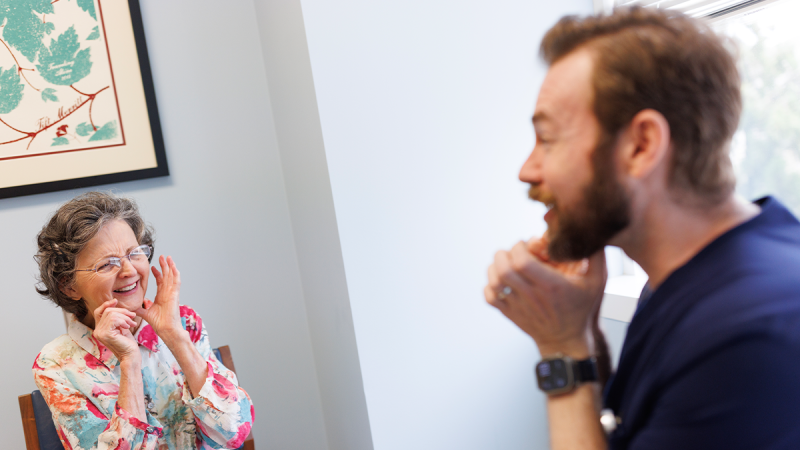 clinician working with a patient on reclaiming her voice