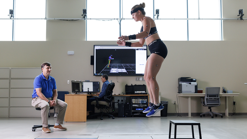 A study participant in the K-Lab jumps from a stool