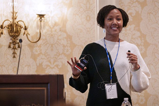 Sherilynn Black speaking to a group