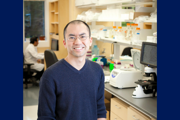 dennis ko standing in his lab