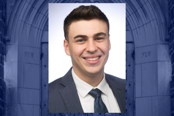 ariel kantor's headshot with the duke arch behind 